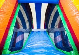 Indoor opblaasbaar multiplay unicorn springkussen met een glijbaan en 3D objecten kopen voor kinderen. Bestel springkussens online bij JB Inflatables Nederland