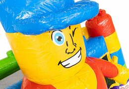 Kleine opblaasbare springkasteel met glijbaan in thema superblocks voor kinderen te koop. Bestel opblaasbare springkastelen met glijbaan bij JB Inflatables Nederland