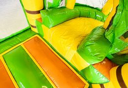 Mini opblaasbare multiplay springkasteel met glijbaan in jungle thema te bestellen voor kinderen. Bestel opblaasbare springkastelen online at JB Inflatables Nederland