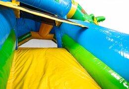 Opblaasbare slide combo luchtkussen in thema hawaii te koop voor kinderen. Bestel nu opblaasbare luchtkussens met glijbaan bij JB Inflatables Nederland