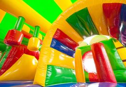 Medium opblaasbare multiplay springkussen met glijbaan in krokodil thema bestellen voor kinderen. Bestel opblaasbare springkussens online at JB Inflatables Nederland