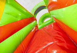 Opblaasbaar springkussen met glijbaan in krokodillen thema te koop 