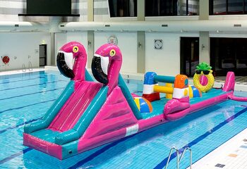 Opblaasbare waterstormbaan huren in flamingo thema voor kinderen