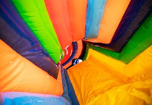 Kruiptunnel circus springkasteel met obstakals, een klimhelling en glijhelling voor kids bestellen. Koop springkastelen online bij JB Inflatables Nederland