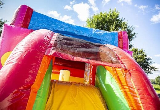 Klein overdekt multifun springkussen kopen in thema unicorn met glijbaan voor kinderen. Koop springkussens online bij JB Inflatables Nederland