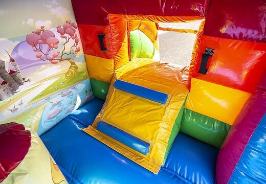 Klein overdekt multiplay springkussen te koop in thema unicorn met glijbaan voor kinderen. Koop springkussens online bij JB Inflatables Nederland