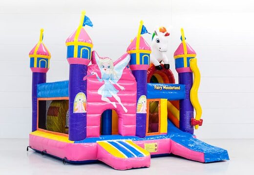 Springkasteel in fairy wonderland theme met een glijbaan bestellen voor kinderen. Koop opblaasbare springkastelen online bij JB Inflatables Nederland