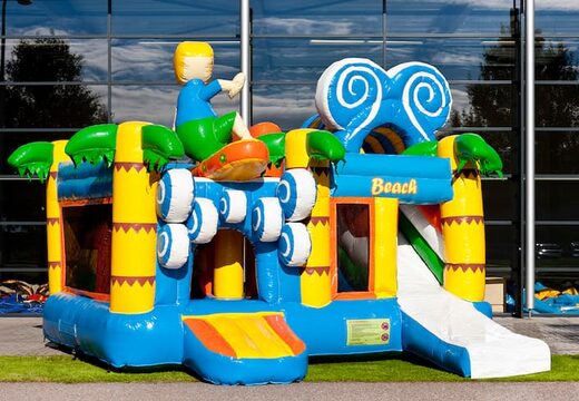 Koop middelmatig opblaasbare multiplay springkussen in beach thema met glijbaan voor kinderen. Bestel opblaasbare springkussens online bij JB Inflatables Nederland