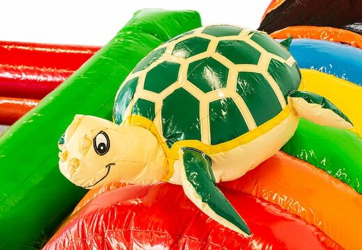 Springkussen in thema tropisch met een glijbaan kopen voor kinderen. Bestel opblaasbare springkussens online bij JB Inflatables Nederland