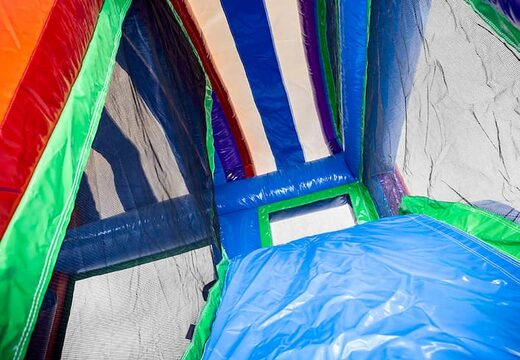 Klein opblaasbare springkussen met glijbaan in unicorn thema kopen voor kinderen. Bestel opblaasbare springkussens online bij JB Inflatables Nederland