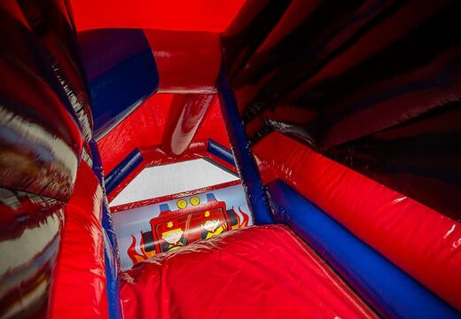 Koop opblaasbare slide combo brandweer springkussen voor kinderen in rood en blauwe kleur. Bestel opblaasbare springkussens met glijbaan bij JB Inflatables Nederland