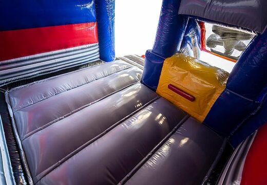 Koop opblaasbare slide combo formule 1 springkussen voor kinderen. Opblaasbare springkussens met glijbaan te koop bij JB Inflatables Nederland