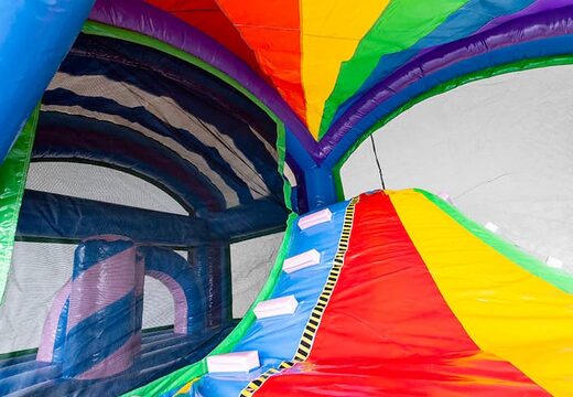 Springkasteel in unicorn thema met een glijbaan bestellen voor kinderen. Koop opblaasbare springkastelen online bij JB Inflatables Nederland