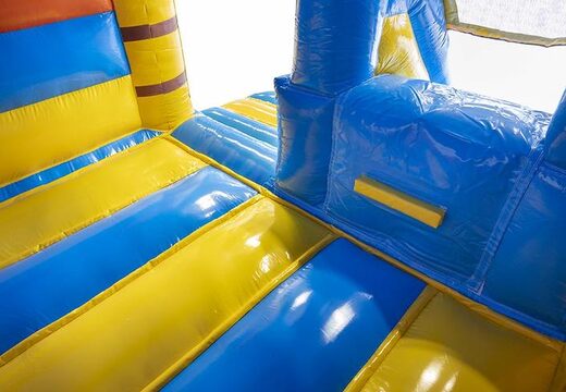 bestel opblaasbaar springkussen met glijbaan in caribbean thema met surfboard erop voor kinderen