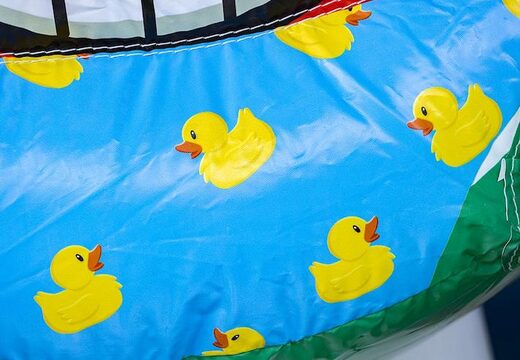 Opblaasbaar luchtkussen met glijbaan in summer party thema bestellen voor kinderen