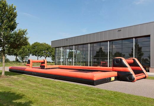 Verplaatsbare en opblaasbare voetbal baan kopen